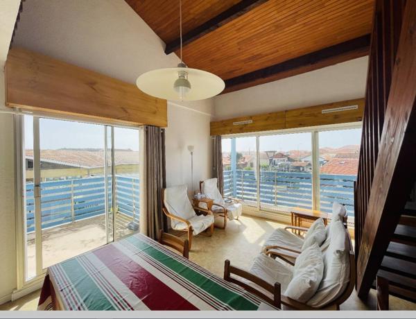 Appartement de deux chambres avec place de parking, en bord de mer à Biscarrosse