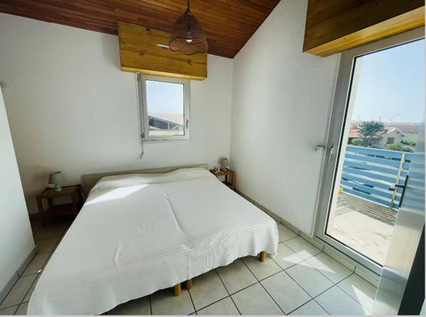 Appartement de deux chambres avec place de parking, en bord de mer à Biscarrosse