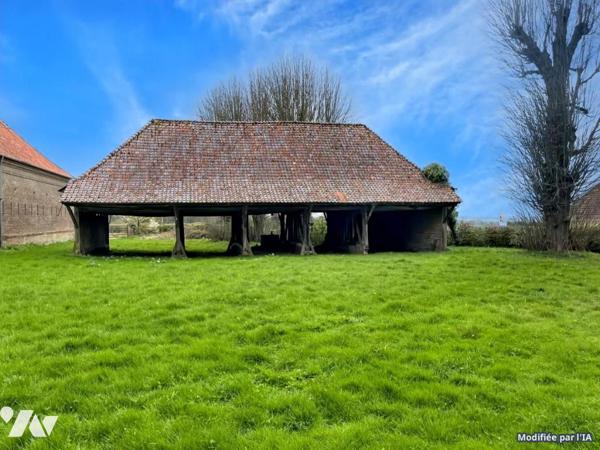 Caumont, terrain à bâtir avec grange en bois et tuiles