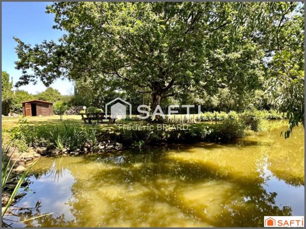 Vairé. Propriété 176m2, terrain 6520m2, 5ch, étang