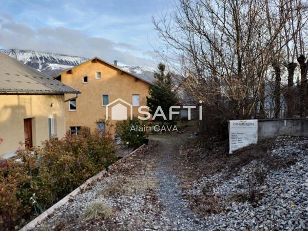 Appartement de 96m² en rez de jardin avec terrasse ,garage et jardin