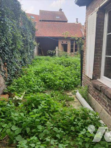 IMMEUBLE USAGE MIXTE DE COMMERCE ET HABITATION