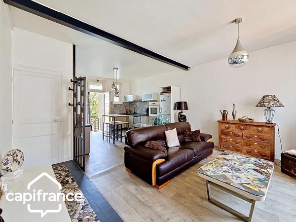 Thouars (79) – Maison de ville 69m² avec 2 chambres, garage et jardin, commerces accessibles à pied