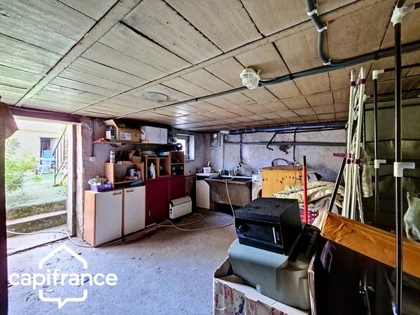Thouars (79) – Maison de ville 69m² avec 2 chambres, garage et jardin, commerces accessibles à pied