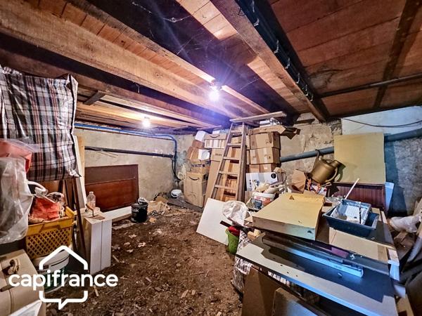 Thouars (79) – Maison de ville 69m² avec 2 chambres, garage et jardin, commerces accessibles à pied