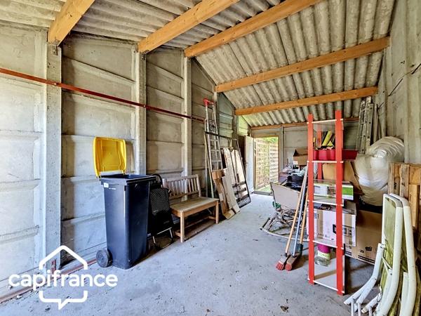 Thouars (79) – Maison de ville 69m² avec 2 chambres, garage et jardin, commerces accessibles à pied