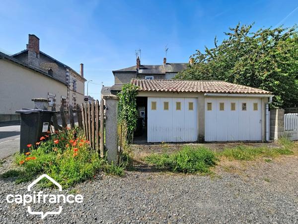 Thouars (79) – Maison de ville 69m² avec 2 chambres, garage et jardin, commerces accessibles à pied