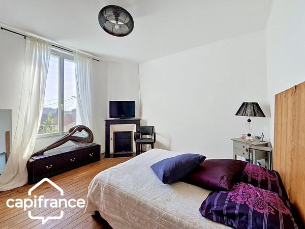 Thouars (79) – Maison de ville 69m² avec 2 chambres, garage et jardin, commerces accessibles à pied
