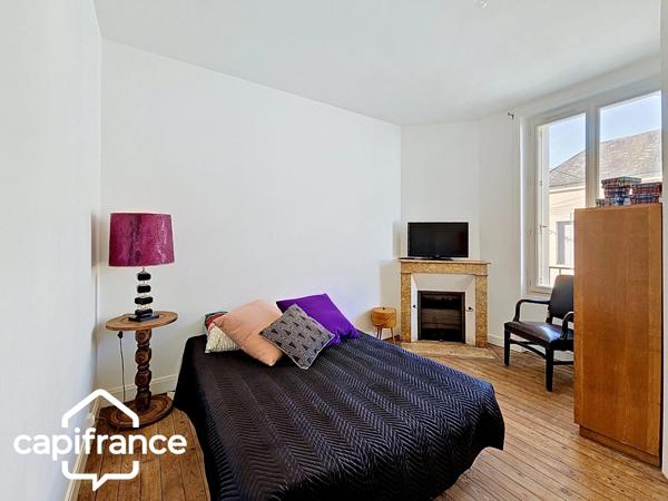 Thouars (79) – Maison de ville 69m² avec 2 chambres, garage et jardin, commerces accessibles à pied