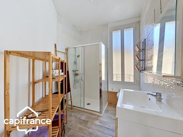 Thouars (79) – Maison de ville 69m² avec 2 chambres, garage et jardin, commerces accessibles à pied