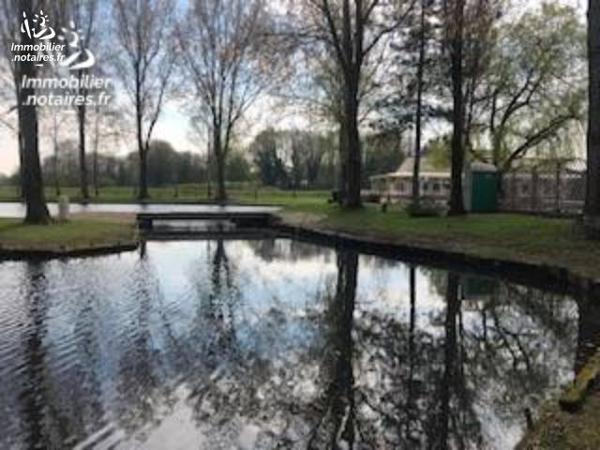 Un ensemble immobilier et fonds de commerce - ESCAUTPONT