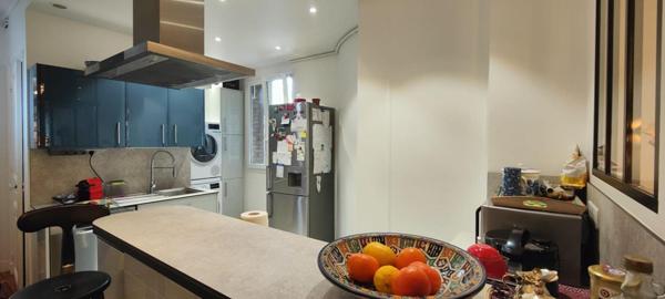 Appartement  4 pièce(s) 88,69 m2 dans un bel immeuble haussmannien, quartier Convention