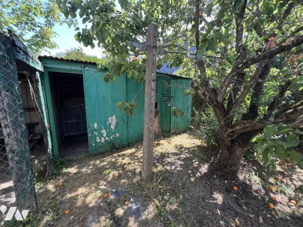 Maison d'habitation + garage