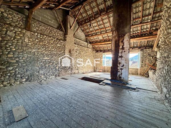 Maison de village avec garage et terrain