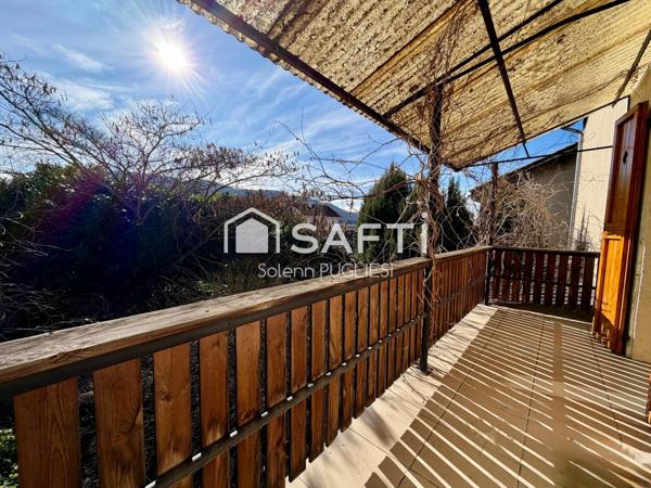 Maison de village avec garage et terrain