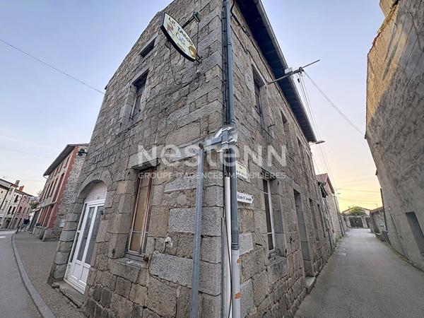 Ensemble immobilier composé d'un local commercial et d'un appartement dans le centre de Grazac