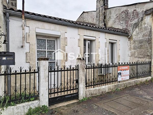 Maison de ville + terrain constructible avec garage