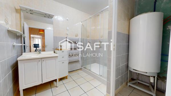 Maison de ville + terrain constructible avec garage