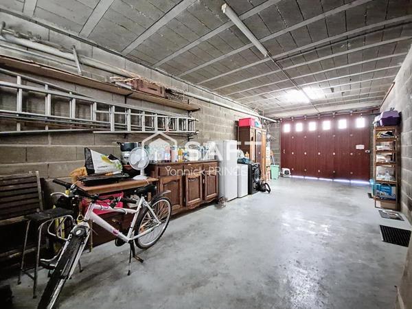 Maison familiale avec T2( 48m2)et garage de 100m2
