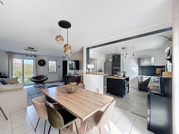 Maison à vendre à Ancenis - quatre chambres, jardin et garage.