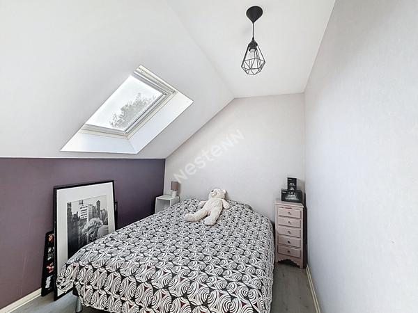 Maison à vendre à Ancenis - quatre chambres, jardin et garage.