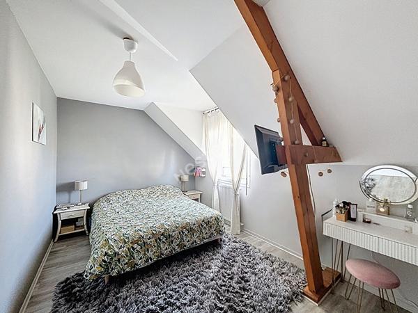 Maison à vendre à Ancenis - quatre chambres, jardin et garage.