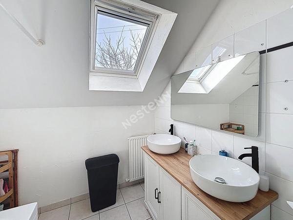 Maison à vendre à Ancenis - quatre chambres, jardin et garage.