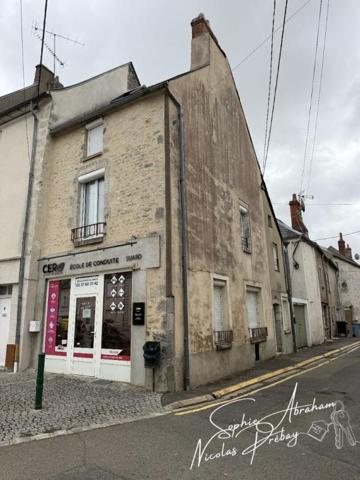 Immeuble avec local commercial et appartement de 3 pièces indépendant