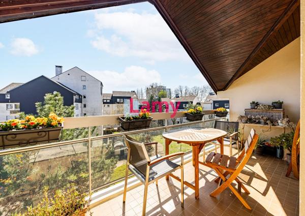 7 pieces en dernier etage avec terrasses et parking