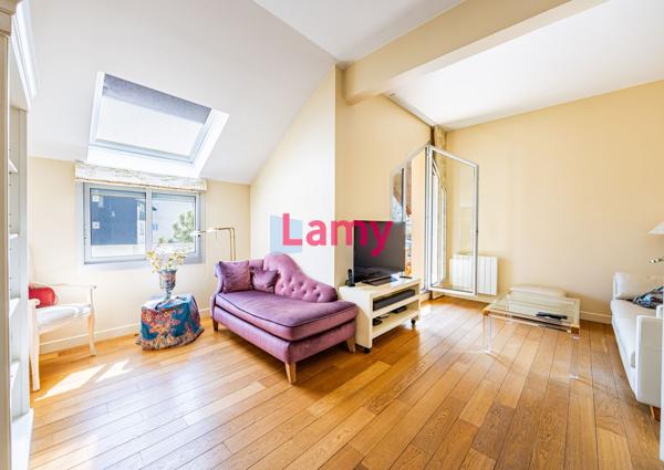 7 pieces en dernier etage avec terrasses et parking