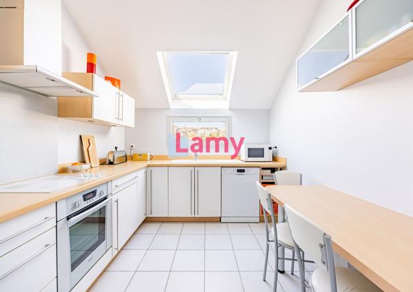 7 pieces en dernier etage avec terrasses et parking