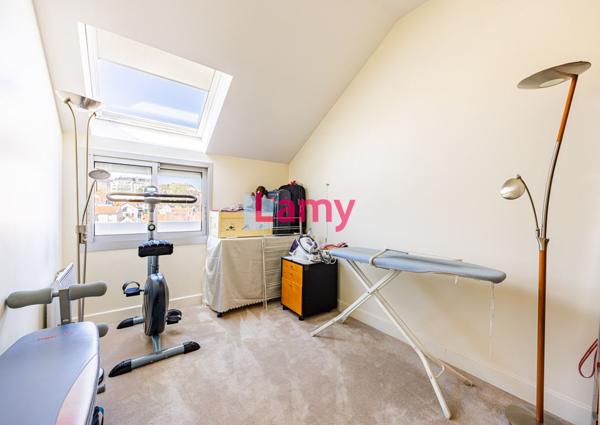 7 pieces en dernier etage avec terrasses et parking