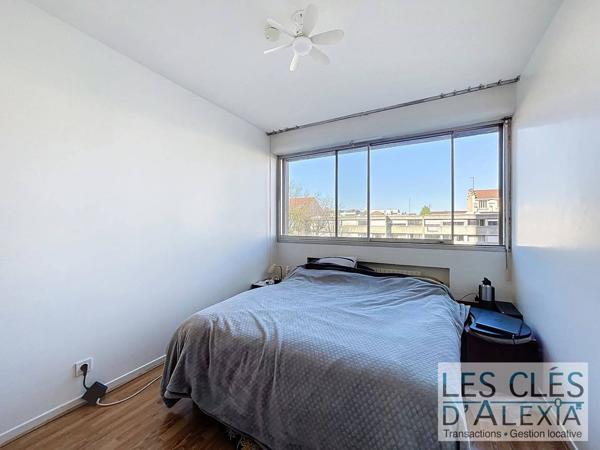 Appartement T4 traversant et lumineux de 82 m² avec balcon, garage et cave – Résidence sécurisée avec ascenseur