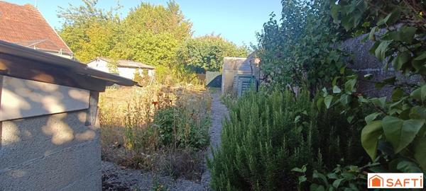 bien composé de 2 maisons