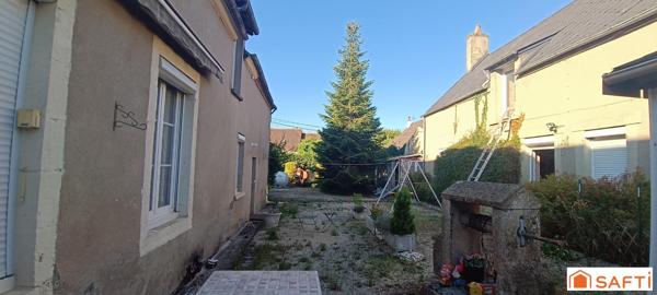 bien composé de 2 maisons