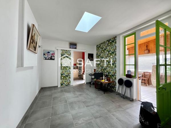 Maison T5 avec jardin et pierres apparentes