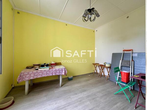 Maison T5 avec jardin et pierres apparentes