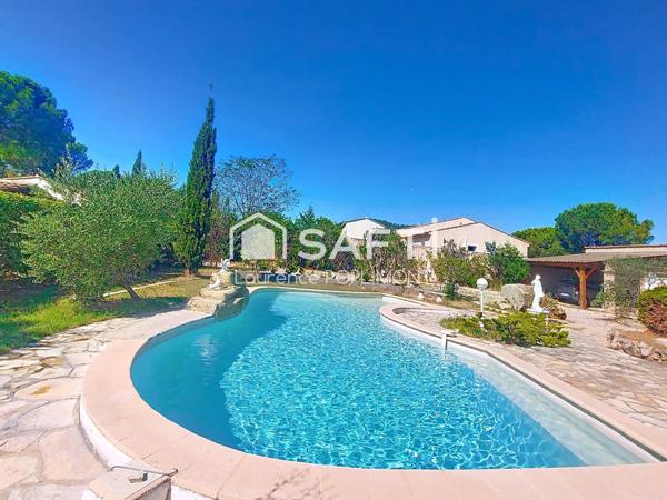 Maison de 115 m2 sur 1502 m2 de terrain, proche commodités,piscine, garage, carport double.