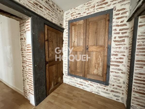 Maison avec local commercial