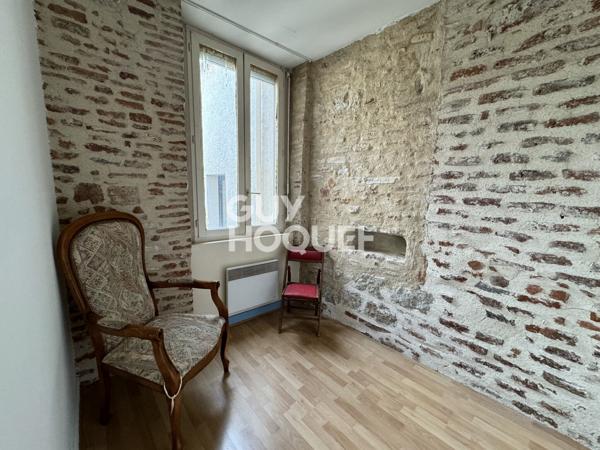 Maison avec local commercial