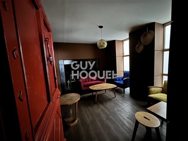 Maison avec local commercial