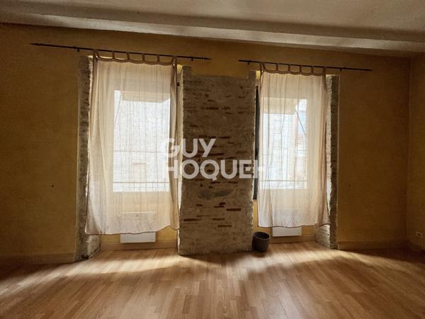 Maison avec local commercial