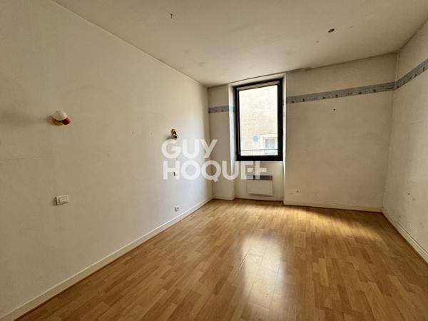 Maison avec local commercial