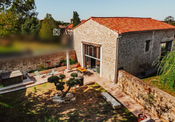 Grange réhabilitée d’exception, alliant authenticité et modernité