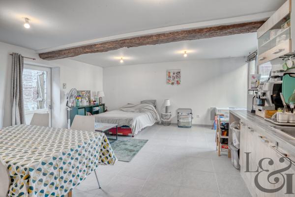 Ensemble immobilier composé d'un local commercial et de 7 appartements au Temple-sur-Lot ( Lot-et-Garonne, 47)