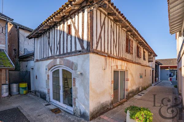 Ensemble immobilier composé d'un local commercial et de 7 appartements au Temple-sur-Lot ( Lot-et-Garonne, 47)