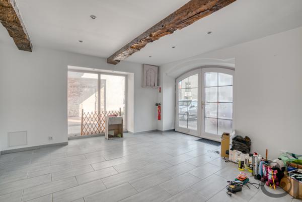 Ensemble immobilier composé d'un local commercial et de 7 appartements au Temple-sur-Lot ( Lot-et-Garonne, 47)