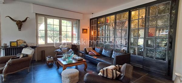 Aux pieds des Cévennes, nichée sur les hauteurs, cette superbe demeure allie harmonie charme, élégance et authenticité. Baignée de lumière, elle vous offre une vue dégagée ainsi qu'un cadre de vie privilégié, propice à la douceur de vivre. Elle est à deux pas de toutes les commodités. 247 m² sur 2 niveaux (plus combles et rez-de-jardin), cette maison vous propose de beaux volumes avec sa pièce de vie de 100 m² environ, cuisine ouverte, salon, espace détente, ouvrant sur l'extérieur, sur la piscine également (8 m x 4 m profondeur 1,5 m, avec douche et WC). La partie nuit se compose de 6 chambres, idéales pour accueillir et recevoir en toute sérénité. 1 salle d'eau avec WC au niveau 1 et 1 salle de bains avec WC séparé au niveau 2. Buanderie. Vous avez la possibilité de transformer les espaces du niveau 0 à votre guise, studio, atelier, sauna... ainsi que les combles. Pompe à chaleur, double vitrage, fibre, toiture en bon état. Le terrain en restanques de 1610 m², soigneusement aménagé vous offre de beaux espaces vous invitant à la détente dans un environnement préservé. Portail électrique, 2 garages. Propriété de caractère offrant espace, confort, au pieds de nos belles Cévennes, dans une atmosphère rare. Contactez moi, j'ai hâte de vous la faire découvrir !
At the foothills of the Cévennes, perched on elevated ground, this magnificent property combines charm, elegance, harmony, and authenticity. Bathed in natural light, it offers open views and an exceptional living environment, ideal for a peaceful lifestyle. Conveniently located just moments from all amenities, this 247 m² home is spread over two levels (plus attic space and a garden level). The house features generous living spaces, including an approximately 100 m² open-plan living area with a kitchen, lounge, and relaxation space opening directly onto the outdoors and the swimming pool (8 m x 4 m, 1.5 m deep, with an outdoor shower and WC). The sleeping area comprises six bedrooms, perfect for accommodating family and guests in complete comfort. There is one shower room with WC on the first level and one bathroom with a separate WC on the second level. A laundry room is also included. The garden-level spaces can be adapted to suit your needs and could be transformed into a studio, workshop, sauna, or other leisure areas, as can the attic space. The property benefits from a heat pump, double glazing, fibre-optic internet, and a roof in good condition. The beautifully landscaped 1,610 m² terraced plot offers attractive outdoor spaces dedicated to relaxation in a preserved natural setting. Additional features include an electric gate and two garages. A character-filled property offering space, comfort, and tranquillity at the foot of the beautiful Cévennes Mountains, in a truly unique atmosphere. Contact me today—I would be delighted to show you this exceptional home.