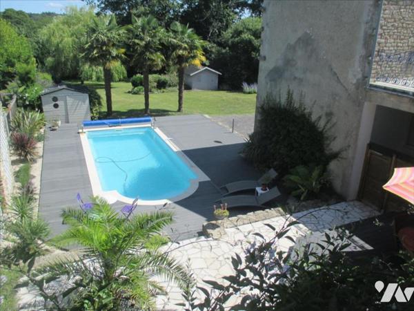 Maison individuelle + 4 logements loués