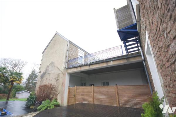 Maison individuelle + 4 logements loués